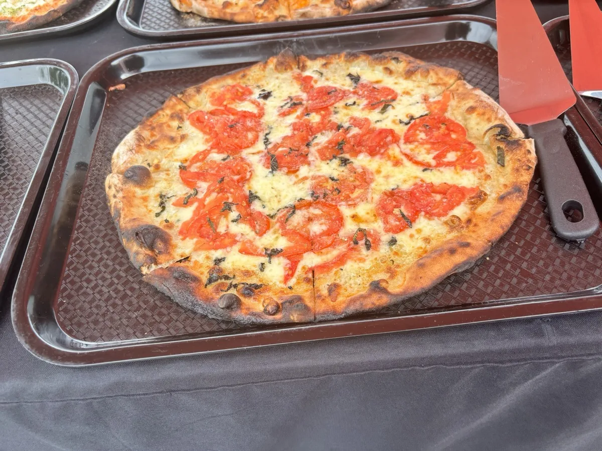 Fresh tomato and basil wood fired apizza from Rollin Dough pizza trailer in Guilford CT