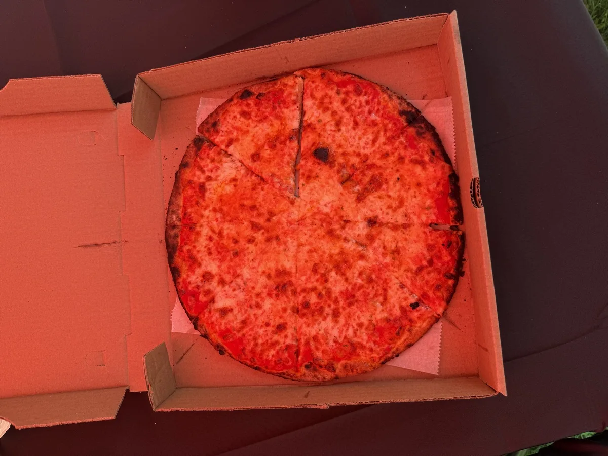 New Haven style cheese apizza with charred crust from Rollin Dough pizza trailer in Guilford CT