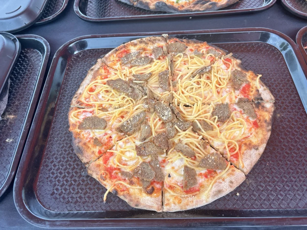 Specialty spaghetti and meatball wood fired apizza from mobile pizza catering in Guilford CT